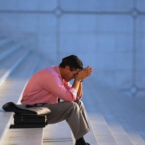 Businessman Thinking on Steps Paris, France